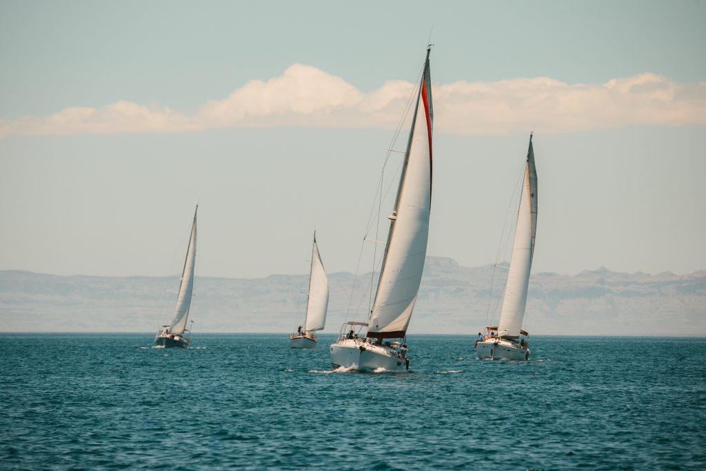Monohulls healing under sail during the Copa Coromuel regatta held in La Paz